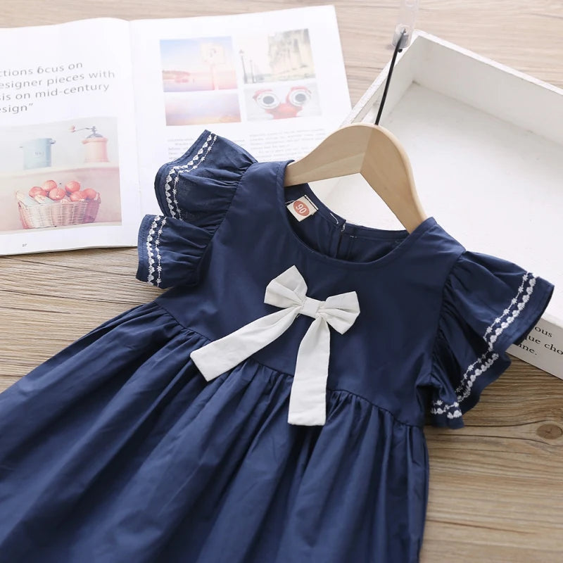 Vestido Infantil com Laço e Mangas Babado – Branco ou Azul Marinho