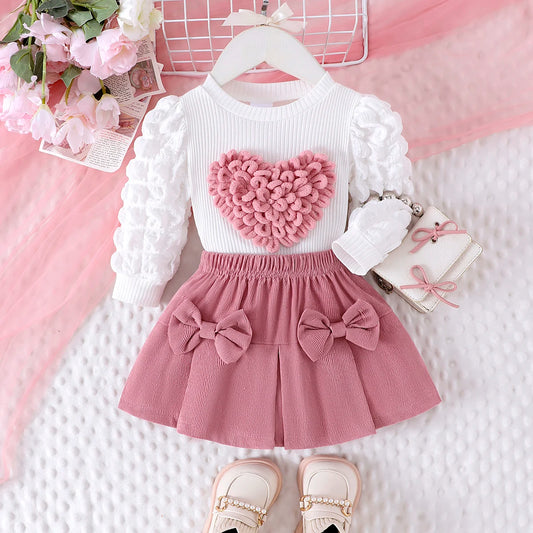 Conjunto Infantil Blusa Coração e Saia com Laços – Charme e Conforto para Pequenas Fashionistas