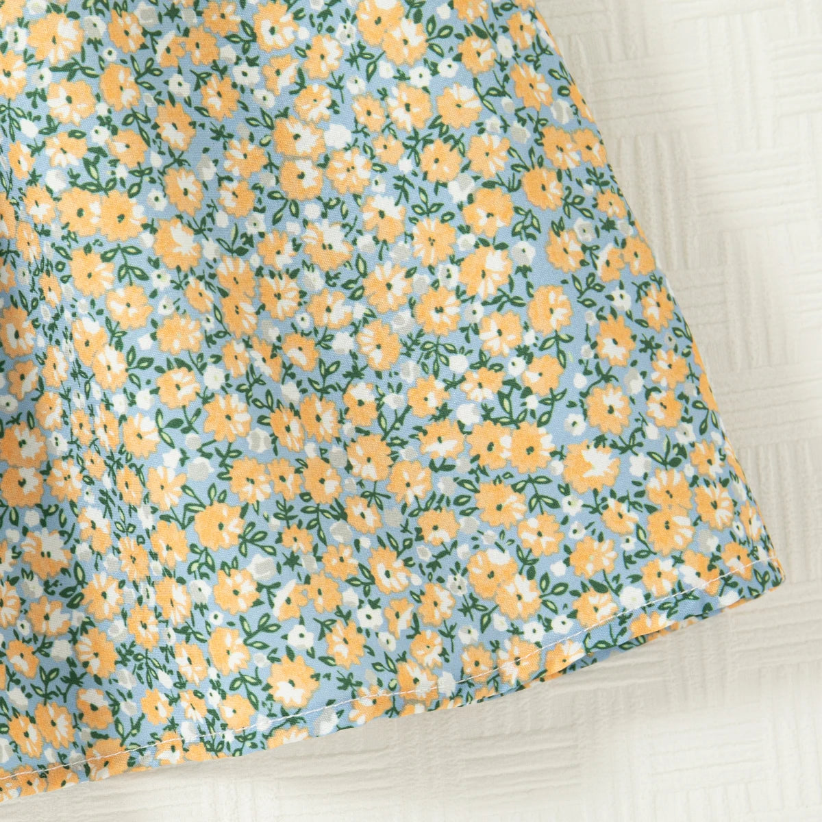 Vestido Infantil Floral Azul com Gola Laço