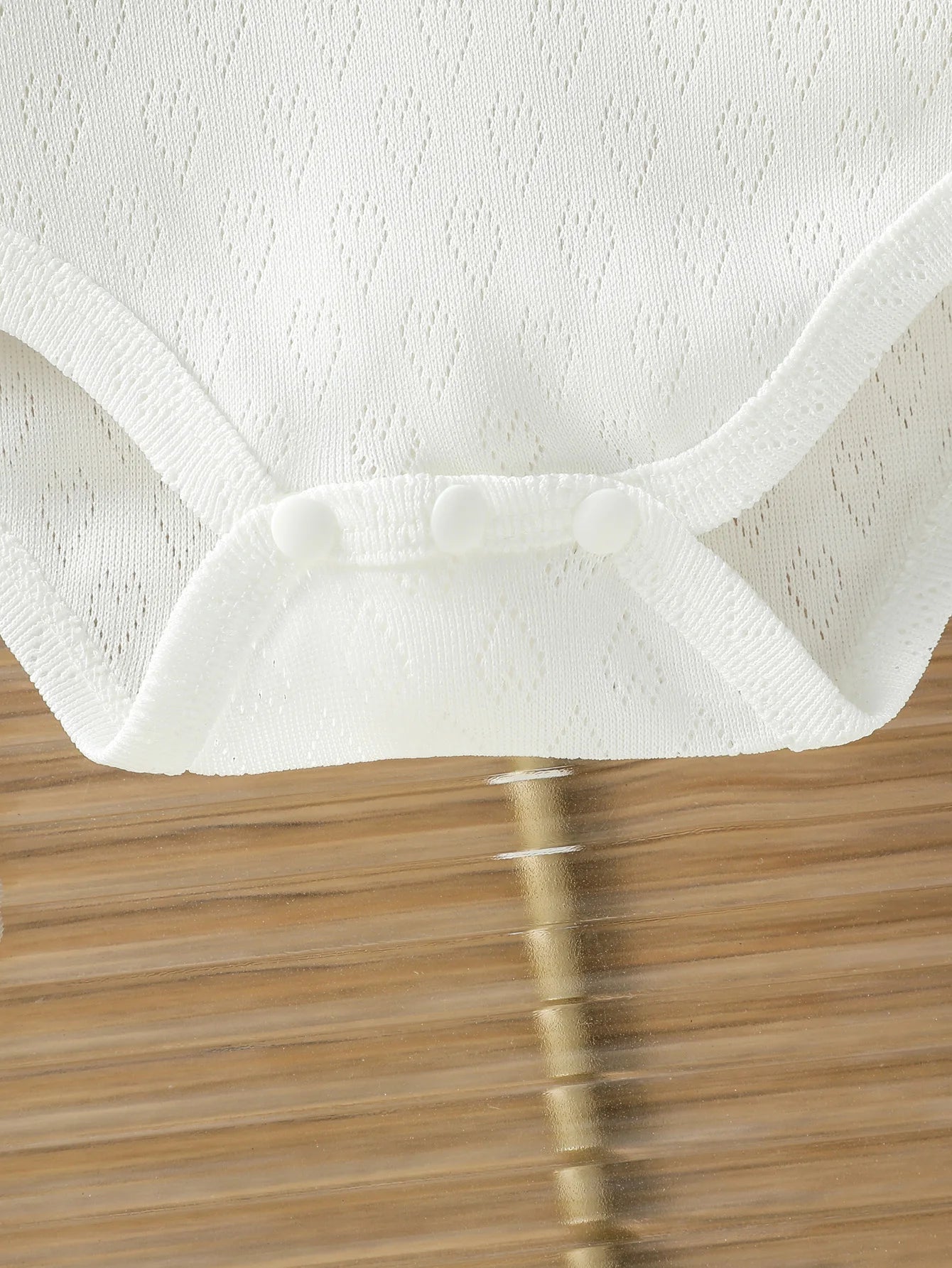 Body Polo Infantil Branco – Conforto e Elegância para o Seu Bebê